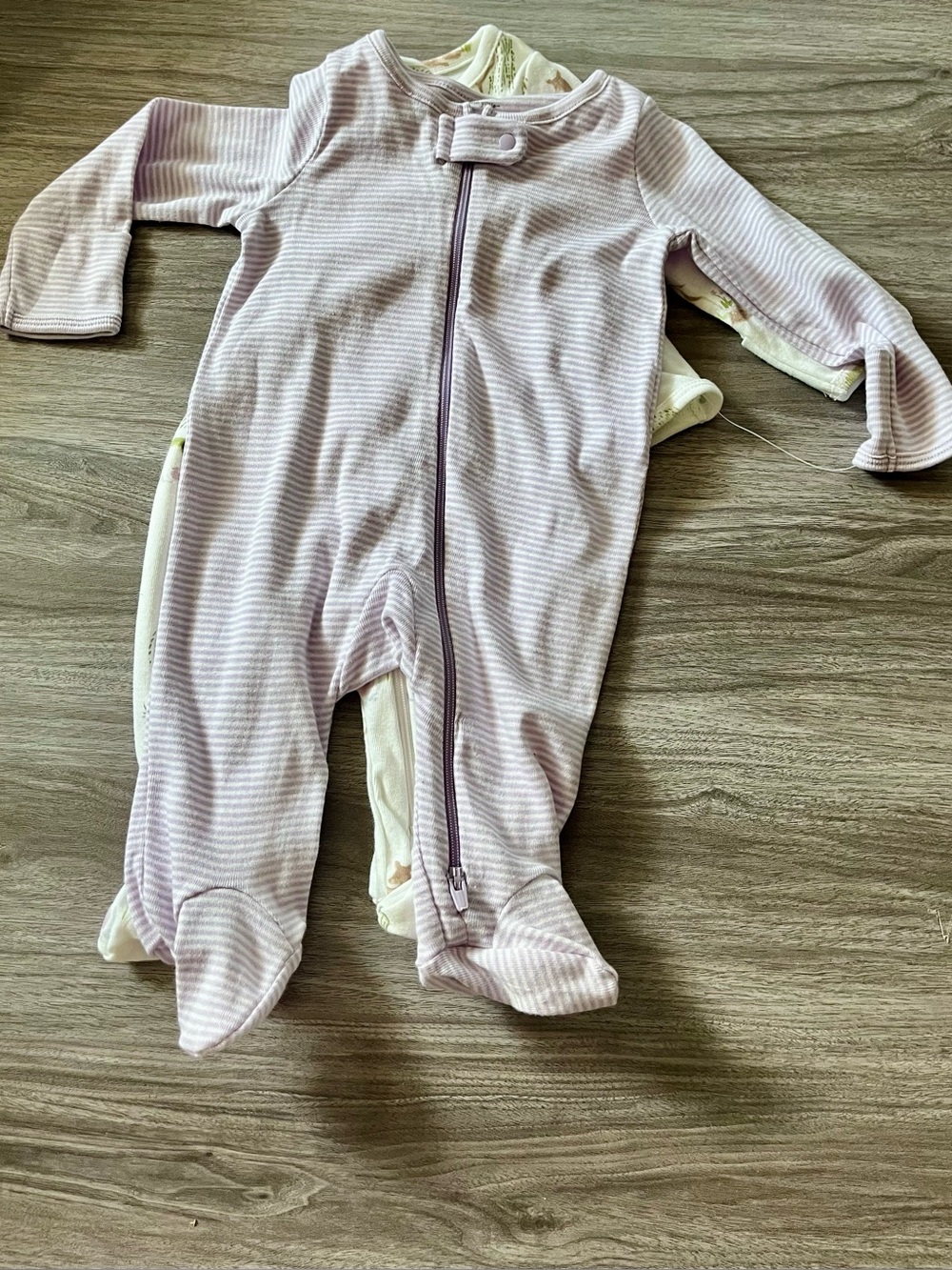 Brand new. Items still connected. Cloud Island two piece Sleepers, Size 3 mos.